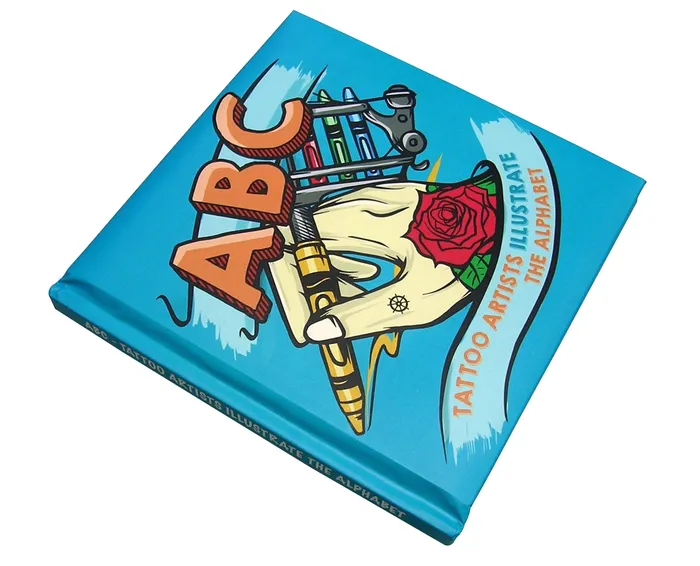 Out of Step Books Dildos ABC Tattoo Artists Illustrate the Alphabet Padded Hardcover Book Out of Step Books Dildos ABC Tattoo Artists Illustrate the Alphabet Padded Hardcover Book